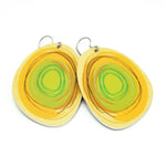 Large solid oval-shaped hoop earrings with yellow graphics by ColorUpLife.