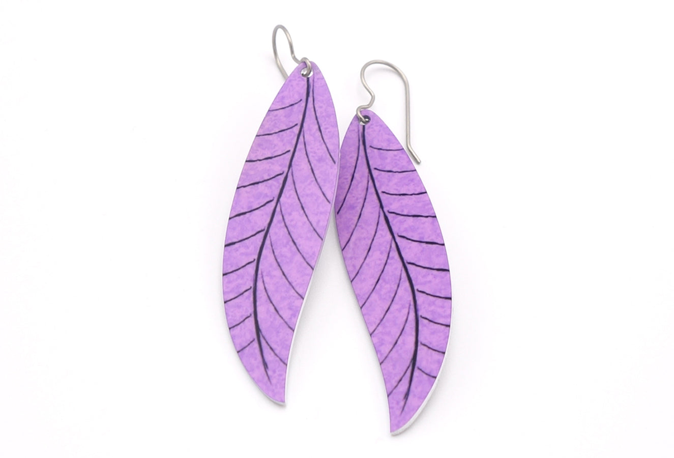 A pair of long lavender leaf earrings by ColorUpLife.