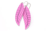 A pair of long dusty pink leaf earrings by ColorUpLife.