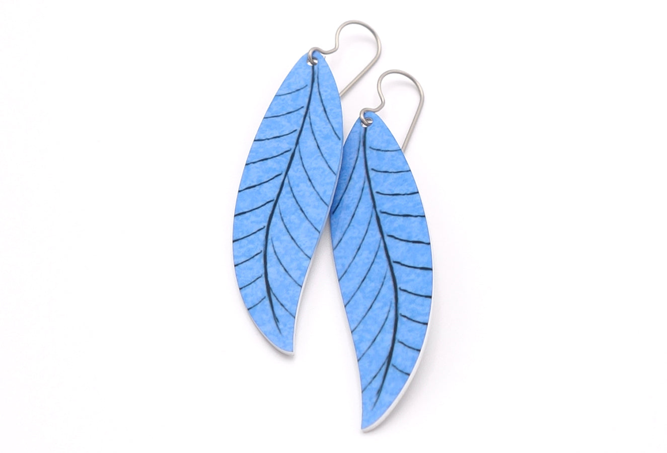 A pair of long sky blue leaf earrings by ColorUpLife.